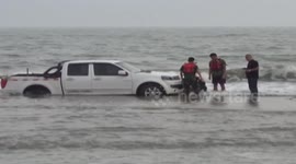 Pickup truck trapped on a beach for eight hours