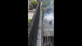 Police use tear gas on protesters in Paris, France