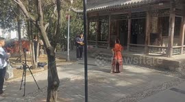 Actress masters Chinese Martial Arts flying knife in Gansu film shoot