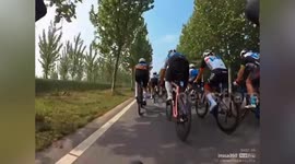 Cyclists fall like dominoes during race in China