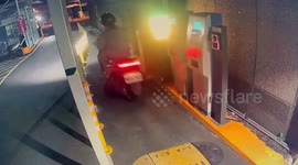 Instant karma! Rider tries to dodge toll barrier but gets clotheslined
