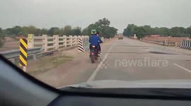 India: Central India highway mishap - police confiscate motorcycle following couple's daring stunts