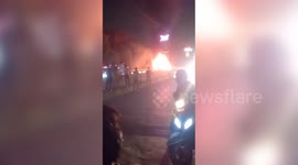 India: Fire breaks out in car on flyover in northern India, passengers escape unhurt