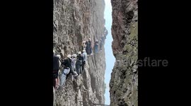 Tourists stranded for up to two hours on terrifying cliff face climb