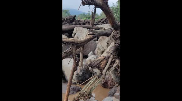 Towns in ruins after flash floods kill 44 in Indonesia