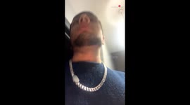 Man steps out of his house and encounters a rogue car on fire