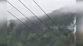Satellite crashes into Chinese mountain causing toxic yellow cloud but missing nearbyhomes