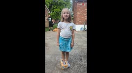 Little girl transforms a discarded tissue box into a regal 'Tis-Shoe'