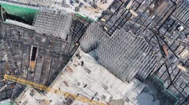 China: Workers are working at a real estate construction site in Wanxiang City