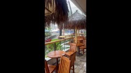 Waikiki beach flooded | Dukes Waikiki Beach Bar Flooded | rain for days | tourists and locals helped built a sand wall to protect the bar from flooding