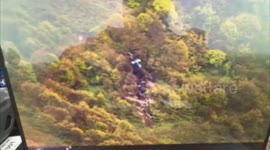 Iran: Iranian Rescuers Find Wreckage Of President's Helicopter
