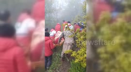 Iran: Iranian Rescuers Retrieve Bodies From Helicopter Wreckage