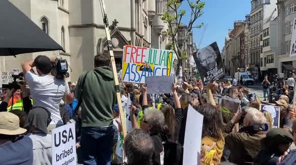 Crowds cheer outside Royal Courts of Justice as Julian Assange wins the right to appeal his extradition to the US