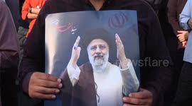 Iranians rally in Tehran to mourn death of president