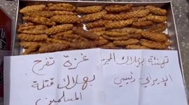 Palestine: People in Gaza distribute sweet celebrating the death of the Iranian President