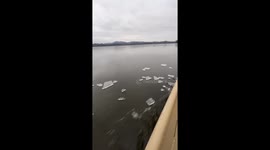 Boat Glides Through Thin Ice
