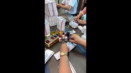 Man shows off his amazing lottery ticket stamping skill in the office