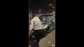Angry Crowd Smashes Porsche car after Teen's Reckless Driving Claims Two Lives