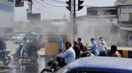 Defogger machines relaxed people's at major intersections of the city on Central India for scorching sun