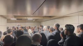 Iran: A crowd of people in the metro station of the Shahr Theater to participate in the funeral of the martyrs