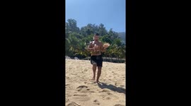 Man With His Hands Full Falls Backwards