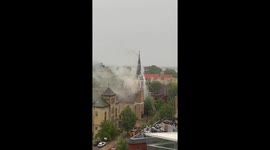 A fire breaks out on the steeple of Holy Redeemer Catholic Church in Madison, WI. A lightning strike is thought to have caused the fire. I was working from home when I noticed the smoke and the firefighters were already on the scene combatting the flames.