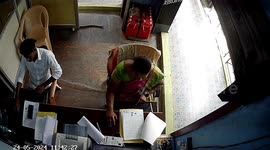 snake unexpectedly emerged from a car and made its way into the lawyer's office under chair