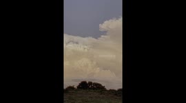 Massive Storm Clouds Illuminated By The Setting Sun in HDR