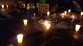 People pray and light candles as a form of solidarity and support for the Palestinian people in Bandung