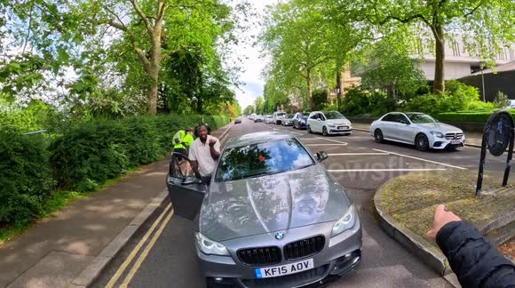 'Get out my f***ing way!' Motorist driving on wrong side of road launches foul-mouthed rant at cyclist YouTuber
