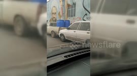 Iran: Protestors in Tehran vandalise the Pictures of the Khomeini's