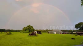 Double rainbow struck by lightning: captured in Shiro, Texas