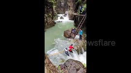 Tourists missing after falling into gorge stream in southern China