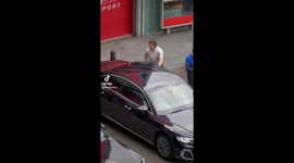 Awkward moment Tom Cruise almost gets into Rishi Sunak's car by mistake in London