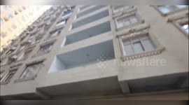Azerbaijan: Firefighter Descends from Above to Rescue Child Trapped in Baku