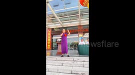 Headmaster dons purple chirpaur to cheer on students before exams