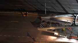 Crews installing a new pedestrian bridge overnight on the closed FDR Drive in New York City.