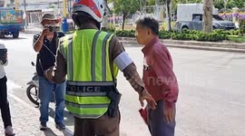 Lawyer scammed out of his life savings protests by pouring faeces over himself at bank