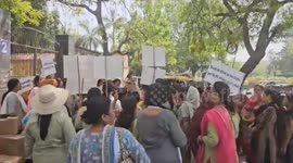 Women's protested near Guru Harikishan Public School located at Patiala House Court demanding Rs 1000 per month from the Delhi government