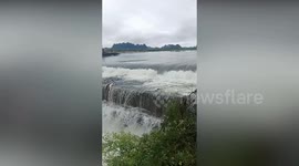 Thousands of fish washed away during torrential rain in China