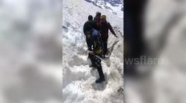 Rescue teams ensure safe passage for pilgrims trekking through mountainous terrain in northern India