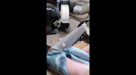 Oiling up the dark caramel honeycomb handle of my freshly finished chefs knife.