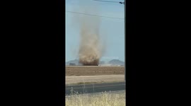 Driver Spots Huge Dust Devil in Field