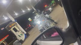 Man on Chrome Motorcycle Spotted at Gas Station