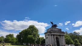 The Red Arrows fly over Buckingham Palace at the end of Trooping The Colour