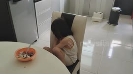 Toddler falling asleep while having lunch alone