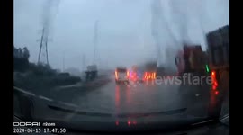 Two killed as power construction crane collapses amid stormy conditions, crushing car in China