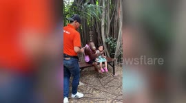Orangutan terrifies little girl when it tries to kiss her at zoo