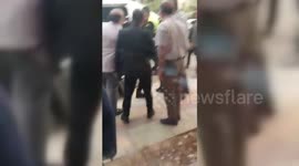 Iranian Morality Police Detain Young Woman for 