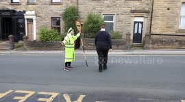 UK's longest-serving lollipop lady, 84, has ‘no plan to retire’ after award